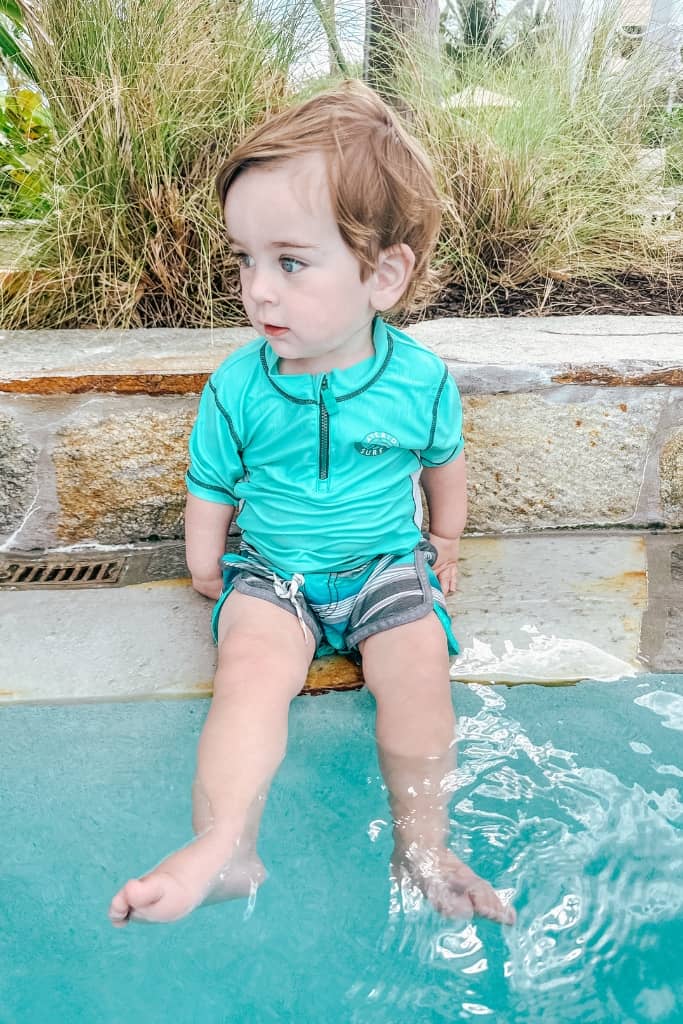 toddler enjoying pools at baha mar, several of the pools are family friendly