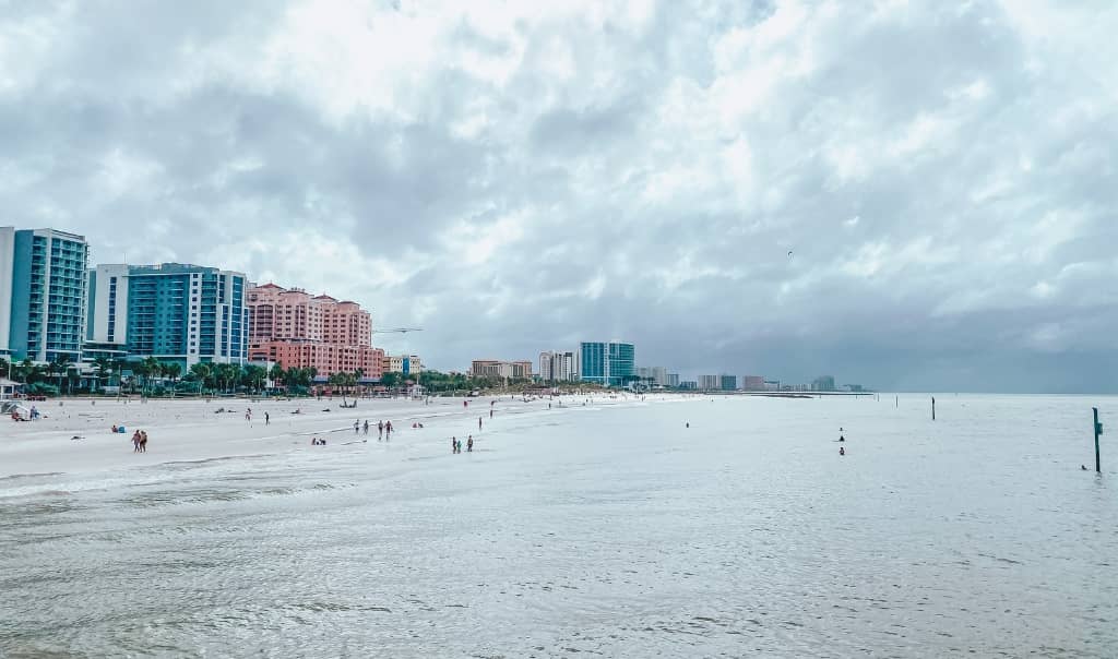 coastline with high rise hotels on the beach from the pier in clearwater beach