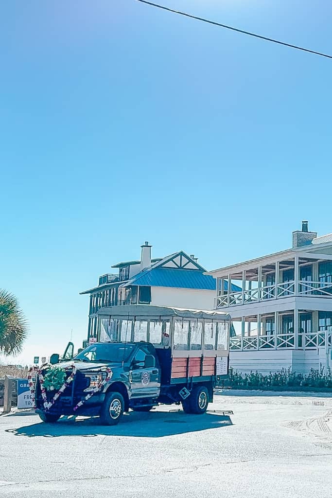 beach tram dropping off beachgoers in santa rosa beach florida on a sunny day