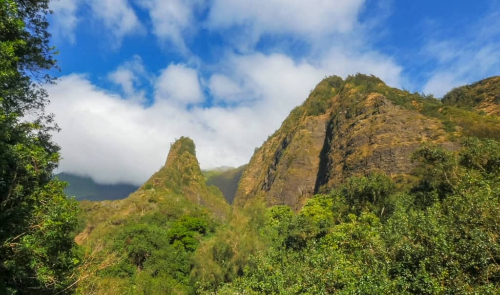 iao valley state park mountain on a sunny day, a huge jagged mountain sticking out